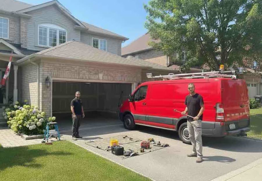 Service van arriving for a same-day garage door appointment